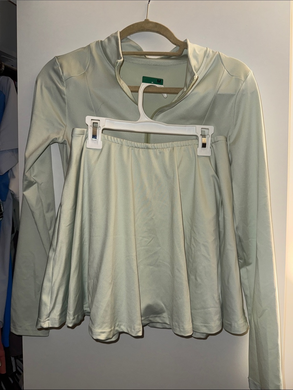 Light green, mint colored athlesiure skirt and zip up set